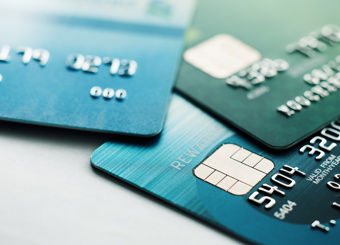 three credit cards on table