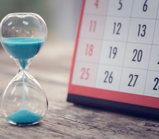 hour glass and corner of a calendar