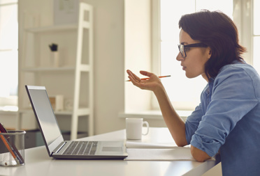 woman sitting at computer