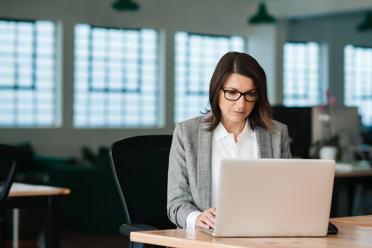 Business Woman Working by Computer