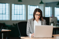 Business Woman Working by Computer