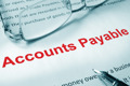 red text on paper accounts payabel
